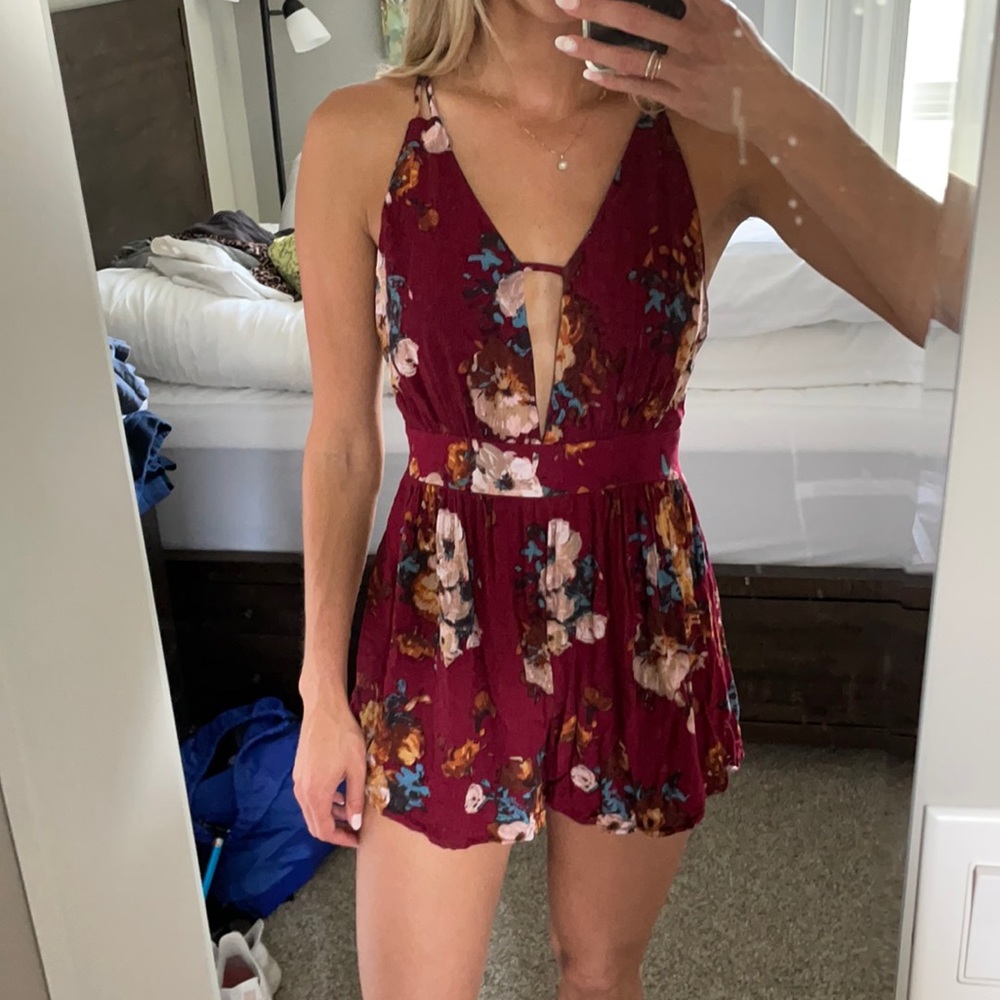Floral romper never been worn